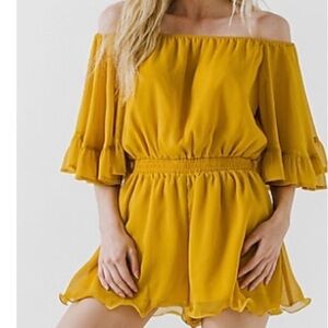 Endless rose ruffled sleeve romper.   Size M.